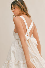 KORA TEXTURED BOW TIE BACK MINI DRESS
