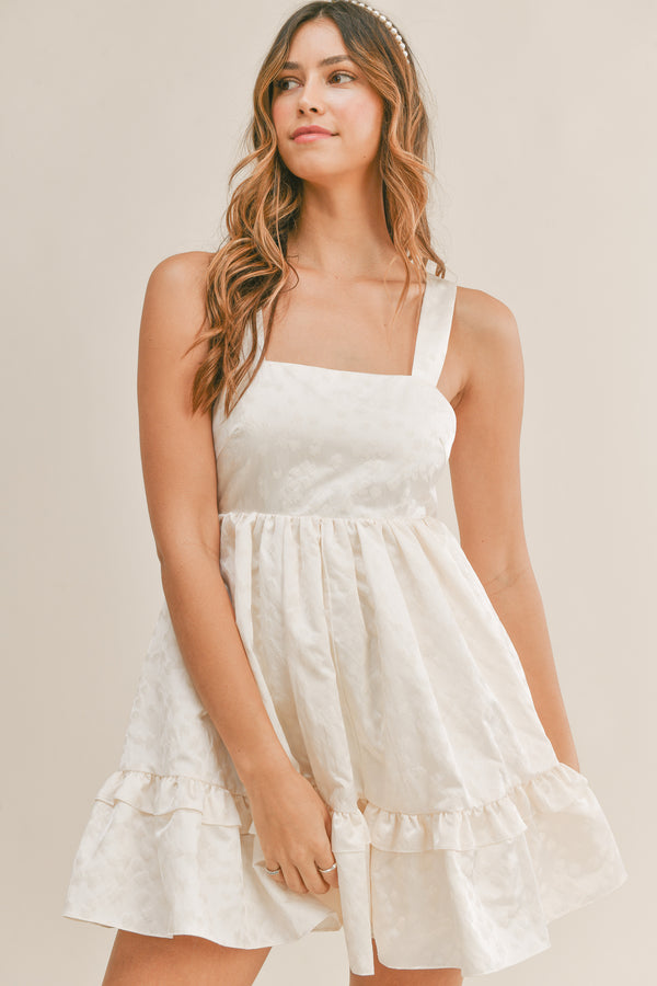 KORA TEXTURED BOW TIE BACK MINI DRESS