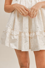 KORA TEXTURED BOW TIE BACK MINI DRESS
