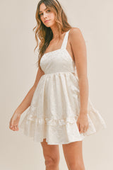 KORA TEXTURED BOW TIE BACK MINI DRESS