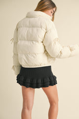 OLIVINE PUFFER JACKET WITH BOW DETAIL