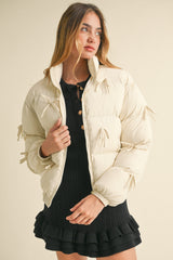 OLIVINE PUFFER JACKET WITH BOW DETAIL