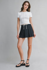 JARA PLEATED TIE FRONT SKORT