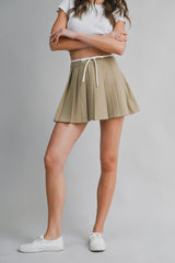JARA PLEATED TIE FRONT SKORT