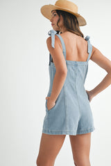 PHOEBE DENIM ROMPER WITH SHOULDER TIE BOW