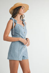 PHOEBE DENIM ROMPER WITH SHOULDER TIE BOW