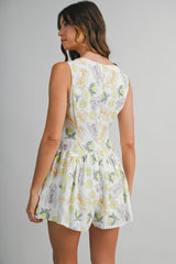 DAISY PRINTED SLEEVELESS TIE FRONT ROMPER