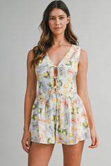 DAISY PRINTED SLEEVELESS TIE FRONT ROMPER