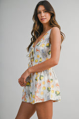 DAISY PRINTED SLEEVELESS TIE FRONT ROMPER