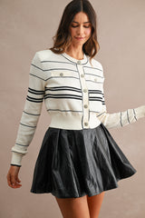 LIA FAUX LEATHER PLEATED MINI SKIRT