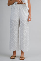 ALAIA EMBROIDERED EYELET TOP AND PANTS SET