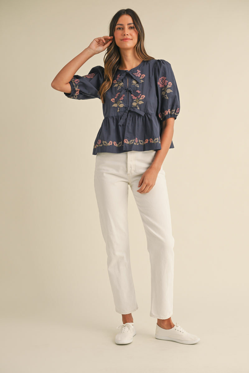 EILENE EMBROIDERED PUFF SLEEVE BOTTOM RUFFLE FRONT TIE TOP