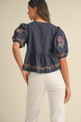 EILENE EMBROIDERED PUFF SLEEVE BOTTOM RUFFLE FRONT TIE TOP