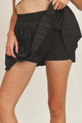 MIRA TENNIS PLEATED SKIRT